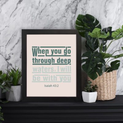 Infidu Isaiah 43:2 Bible Wall Art with a beige background, green modern block-style text, and a clean, minimalist design. displayed on the table in a black frame