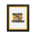 Inspirational quote wall art with "Believe In Yourself" on a white and yellow background and black framed on the wall. Perfect for motivating your workspace.