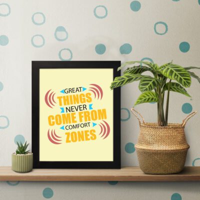 Infidu Great Things Never Come From Comfort Zone - Inspirational & Motivational Quotes Wall Art in black and yellow text for home or office decor. displayed on the table in a black frame