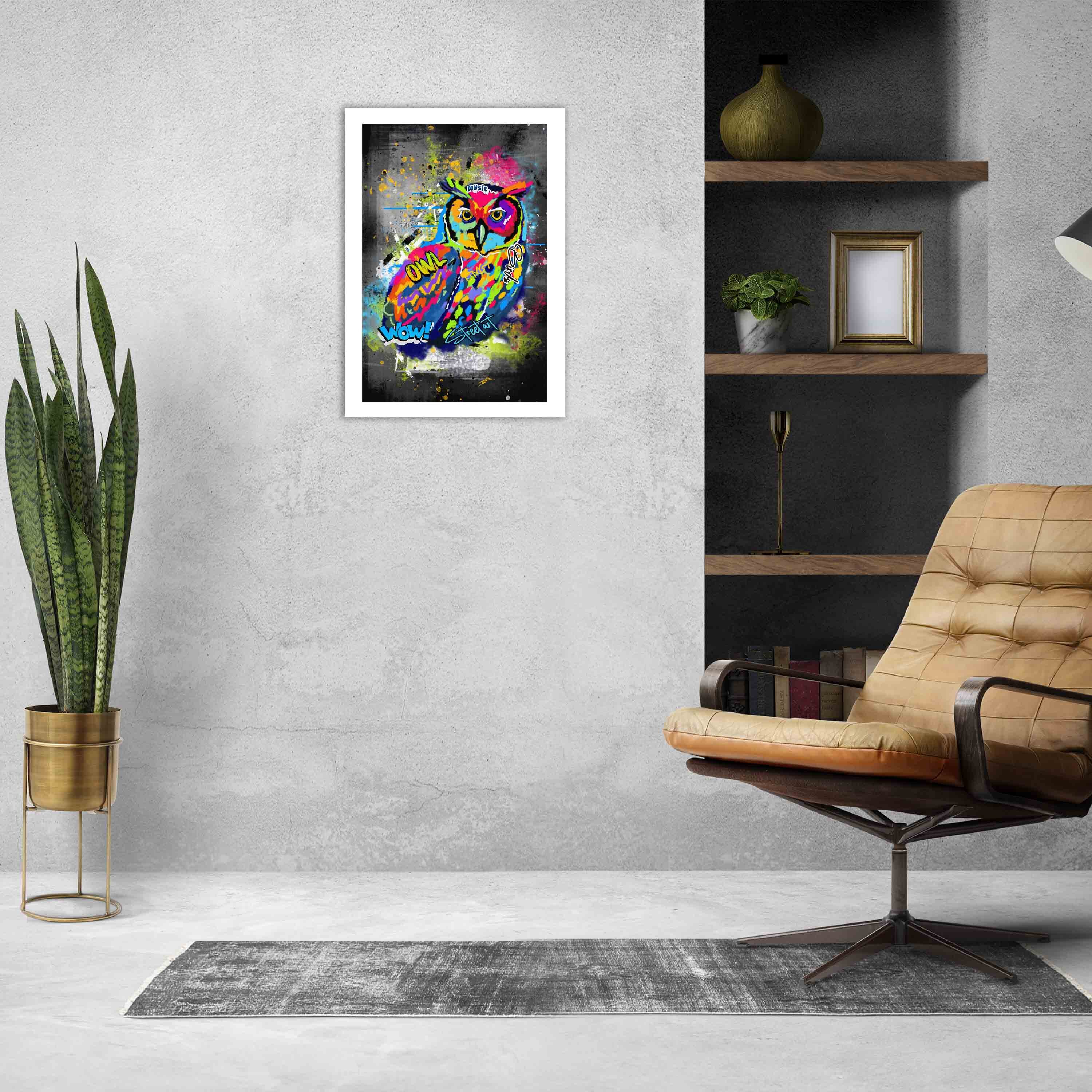 Graffiti-style wall art featuring a colorful owl with bright shades of blue, yellow, red, pink, and green on a dark, edgy background.