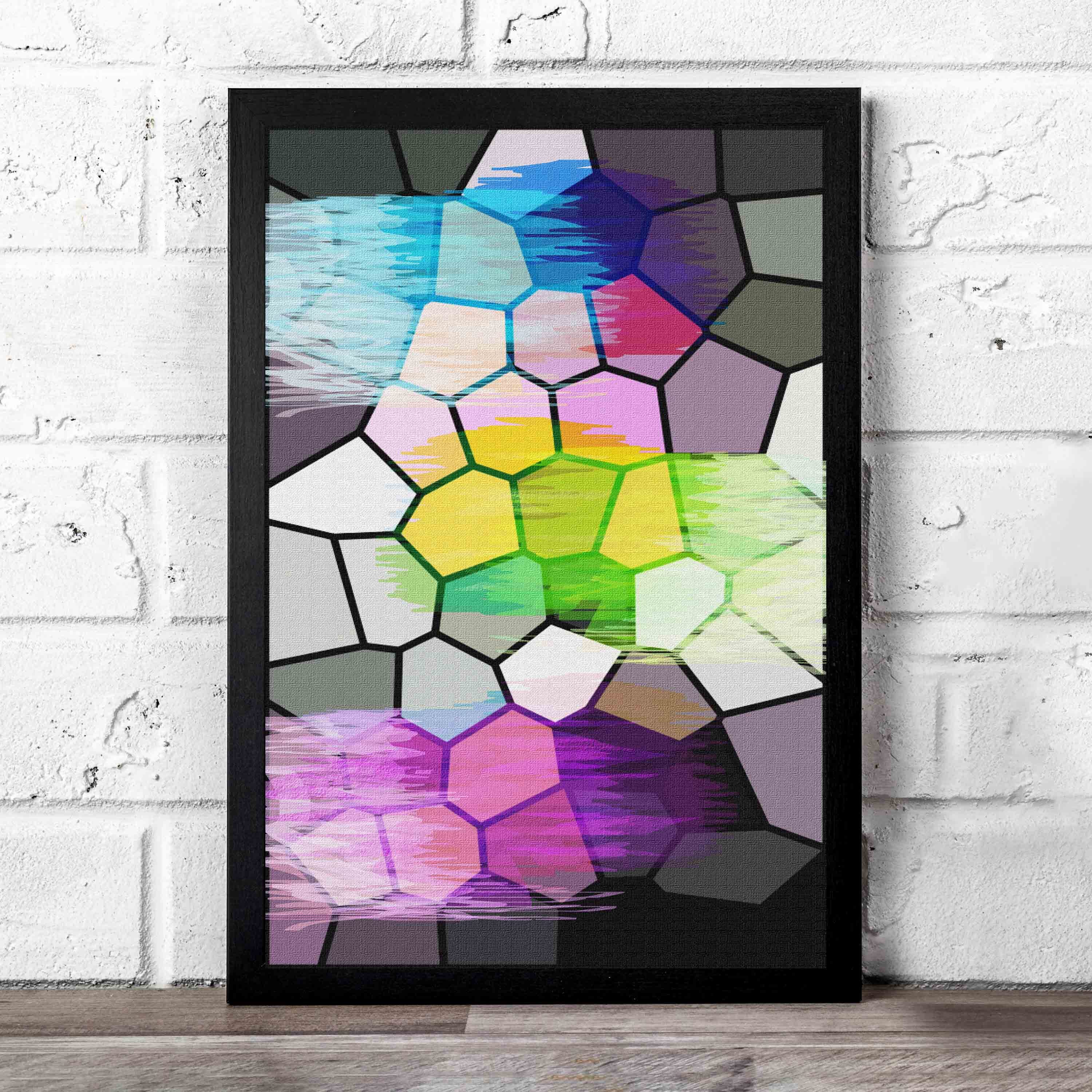 Abstract wall art with a stained glass-style mosaic design in shades of blue, purple, green, pink, yellow, and gray, framed in black.