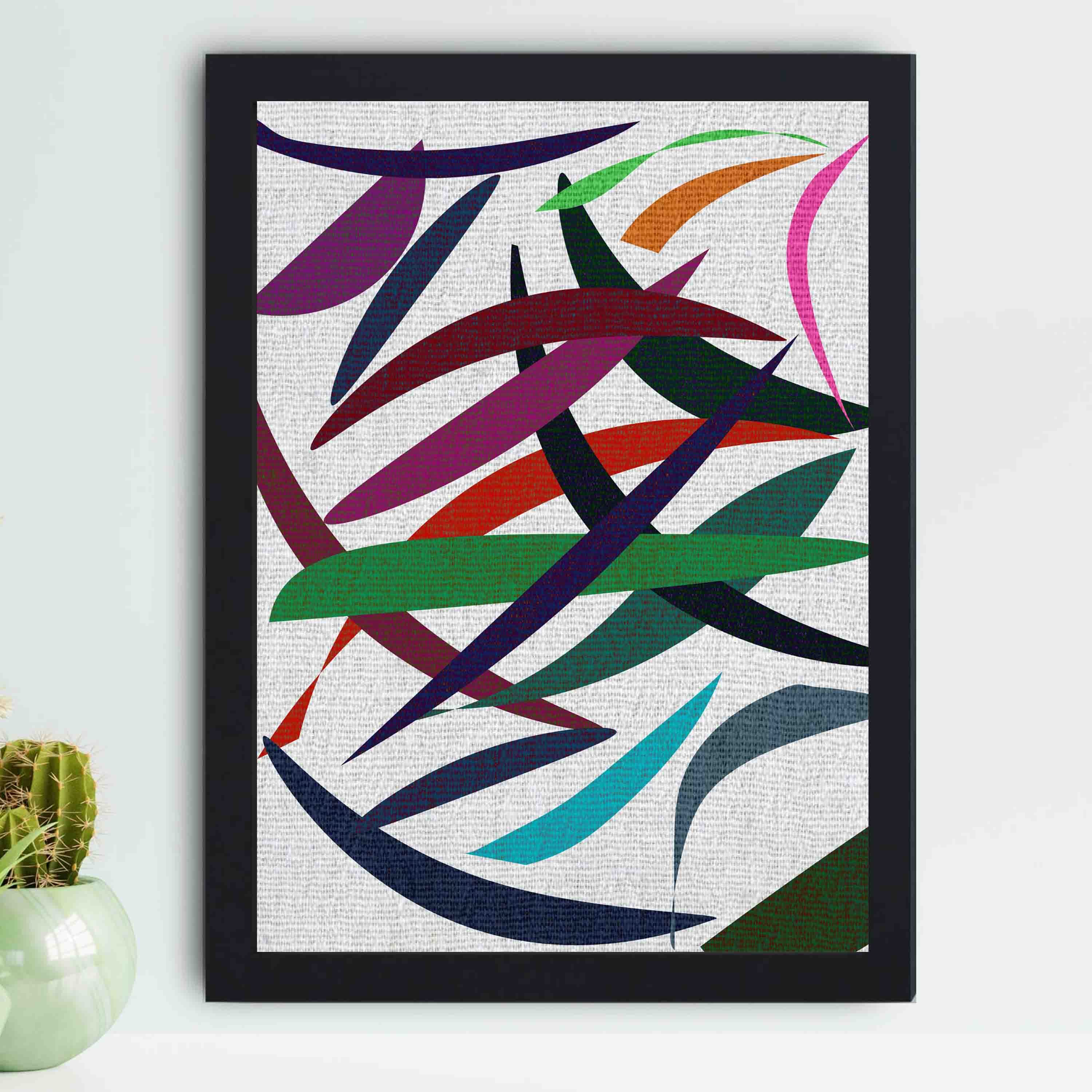 Abstract wall art with overlapping red, green, blue, purple, and pink shapes on a textured white background, framed in black wood.