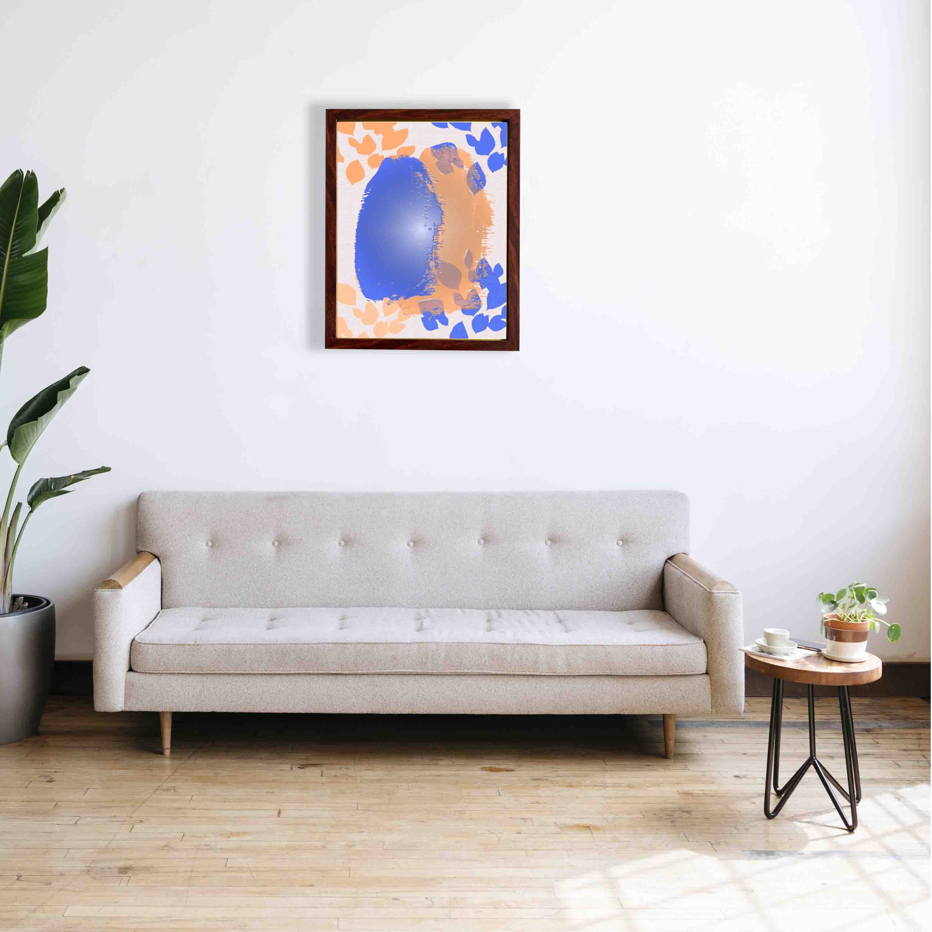 Abstract wall art with a large blue shape and orange brushstroke-like patterns on a white background, creating a bold and modern look.