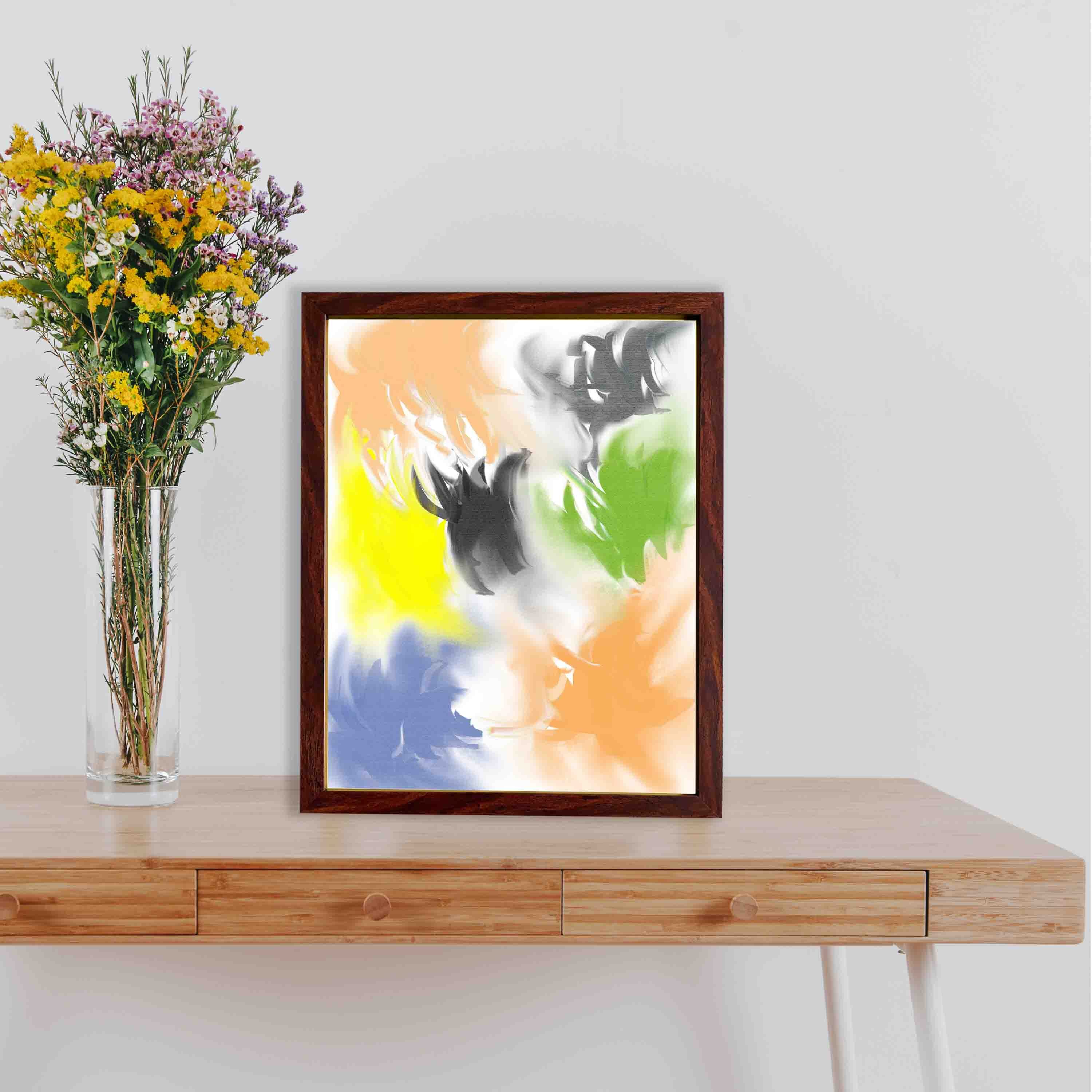 Abstract wall art with a watercolor-style design in shades of orange, yellow, green, blue, and gray, framed in a dark brown wooden frame.
