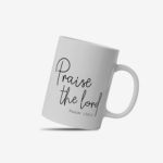 White coffee mug with "Praise the Lord" in elegant cursive and "Psalm 150:1" below. A microwave-friendly espresso cup for faith and inspiration.