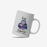 White coffee mug with "Love Owlways" in a handwritten style, featuring three adorable owls in shades of blue and purple. A microwave-friendly espresso cup.