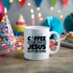 White coffee mug with "Coffee Gets Me Started, Jesus Keeps Me Going" in bold black and blue text, a coffee cup icon, and a light blue splash effect.