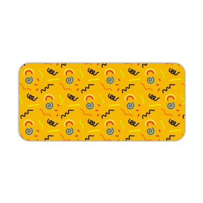 Desk pad with a bright yellow background featuring black curved lines and blue circular shapes. Desk Pad kept on a plain white background