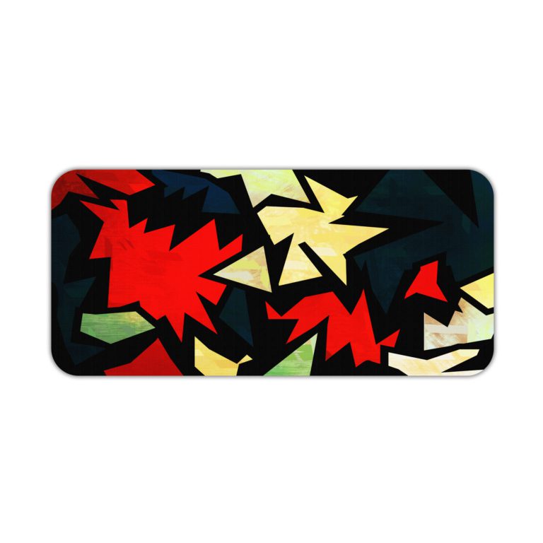 Infidu Artistic Patterns Desk Pad with sharp, jagged shapes in a zigzag design featuring bold colors like red, white, green, and black. Desk Pad kept on a plain white background