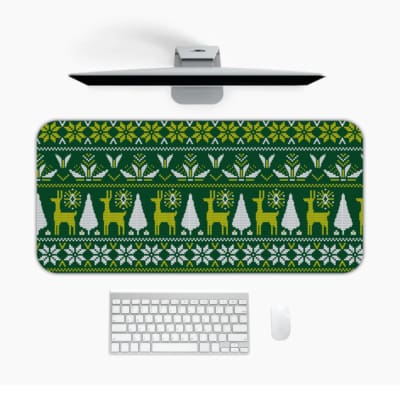 Infidu Knitted Pattern Desk Pad with a dark green background featuring white reindeer, Christmas trees, and snowflakes. Desk Mat with a Computer