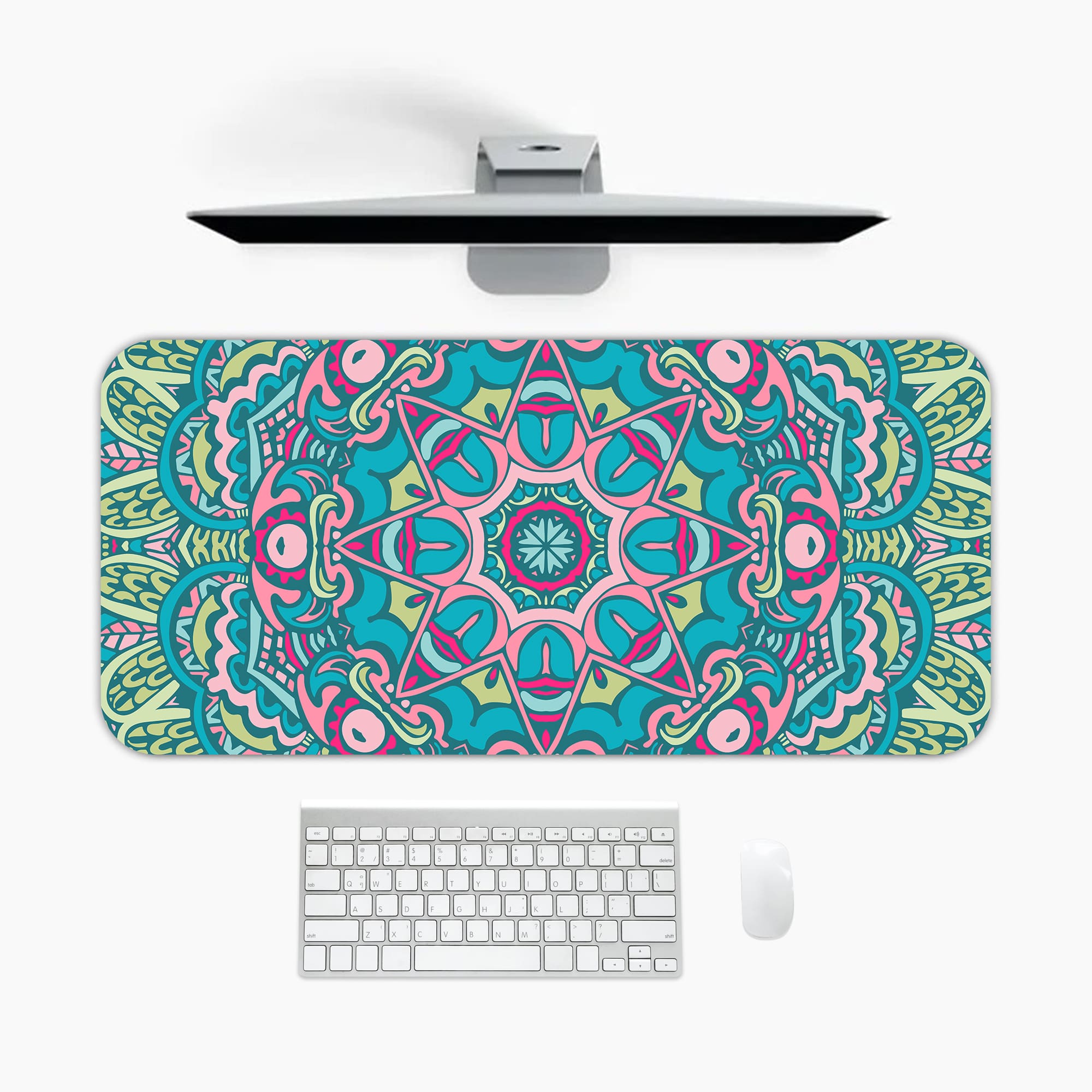 Infidu Colorful Teal and Pink Mandala Design Desk Pad with intricate teal, pink, and white patterns. A desk pad under the computer