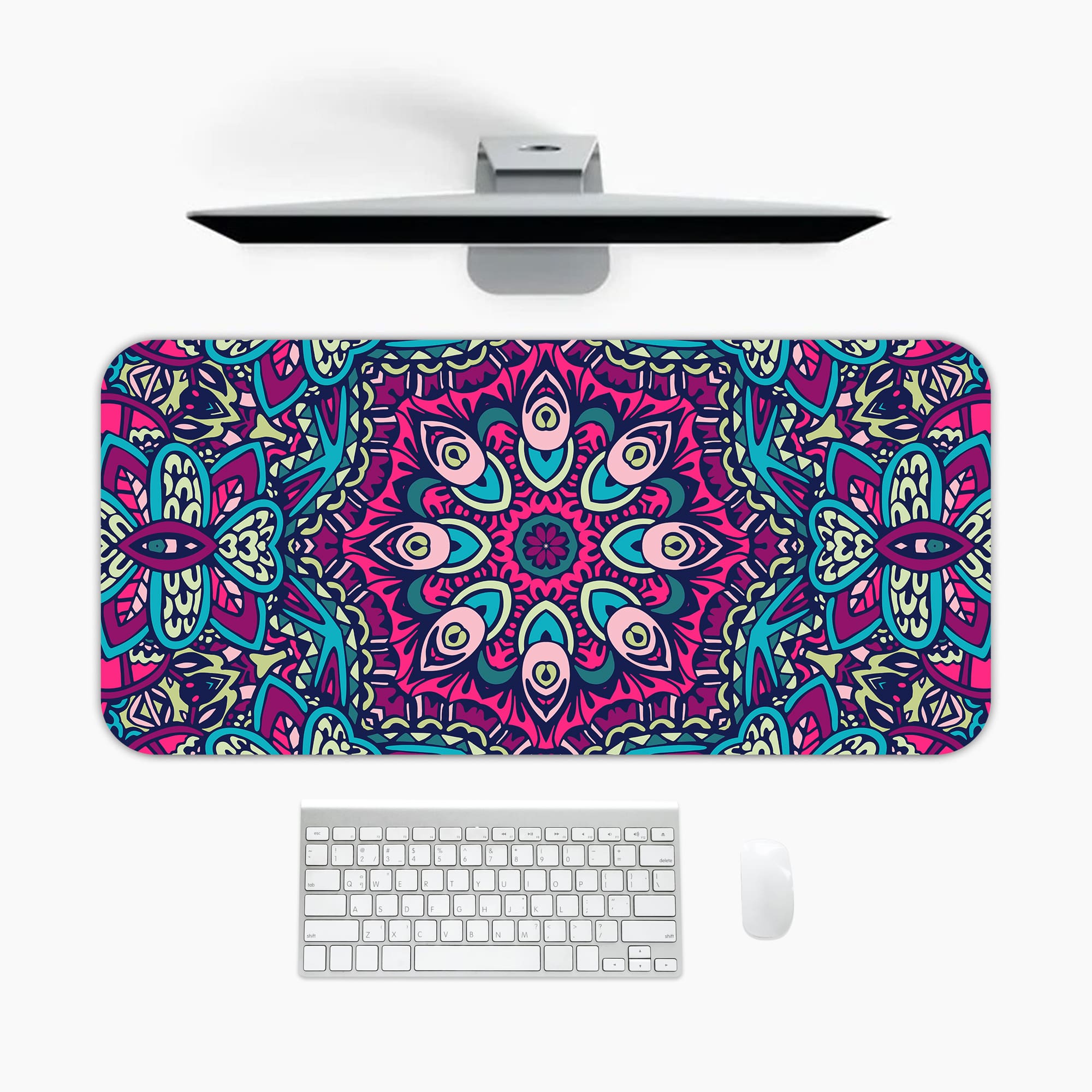Infidu Colorful Mandala Design Desk Pad with intricate patterns in pink, blue, purple, and teal, plus white and black accents. A desk pad under the computer