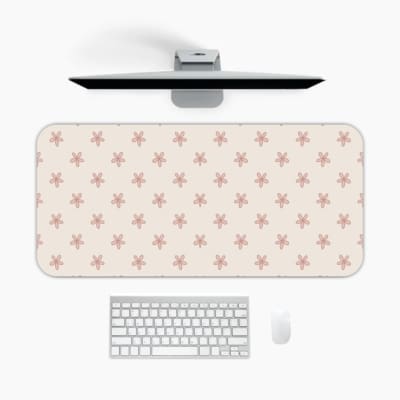 Light pink desk pad with small star design, perfect for adding charm to your workspace. A desk pad under the computer