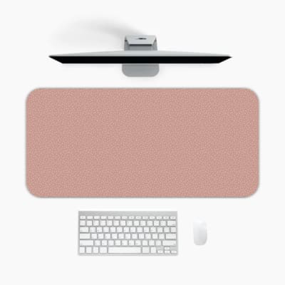 Infidu Light Pink Desk Pad with a plain, soft pink design A desk pad under the computer