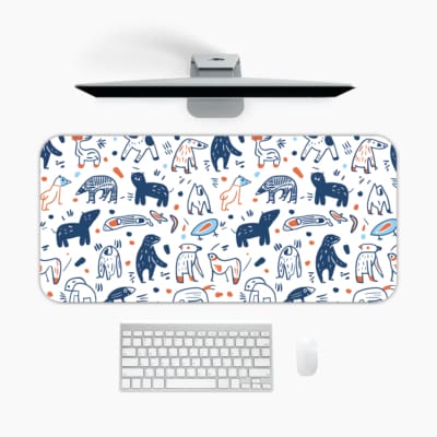 Infidu Blue and White Animal Shapes Playful Design Desk Pad with abstract shapes on a light background. A desk pad under the computer