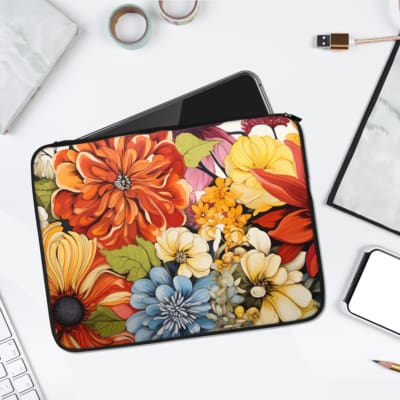 Infidu Colorful Floral Design Laptop Sleeve with vibrant blooms in red, orange, yellow, blue, and white. laptop sleeve kept on a plain white background