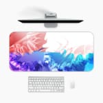 Desk pad with a gradient color design transitioning from red to blue and green, featuring abstract wavy patterns. A desk pad under the computer