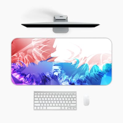 Desk pad with a gradient color design transitioning from red to blue and green, featuring abstract wavy patterns. A desk pad under the computer