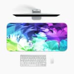 Infidu Watercolor Gradient Abstract Desk Pad with vibrant blue, purple, green, and white colors in a gradient pattern. A desk pad under the computer