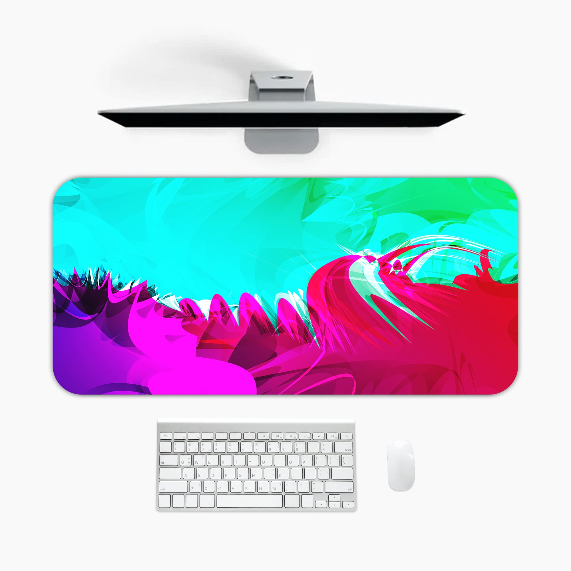 Infidu Vibrant Green and Pink Gradient Desk Pad with wave-like patterns in green, pink, and purple A desk pad under the computer