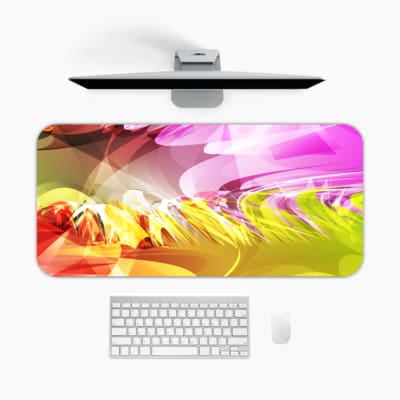 Infidu Colorful Abstract Wavy Lines Desk Pad featuring vibrant, flowing lines in pink, purple, yellow, orange, and green. A desk pad under the computer