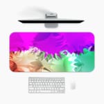 Infidu Dreamy Purple and Green Abstract Desk Pad with soft, blended colors in purple, green, and pink, featuring a smooth, dreamy design. A desk pad under the computer