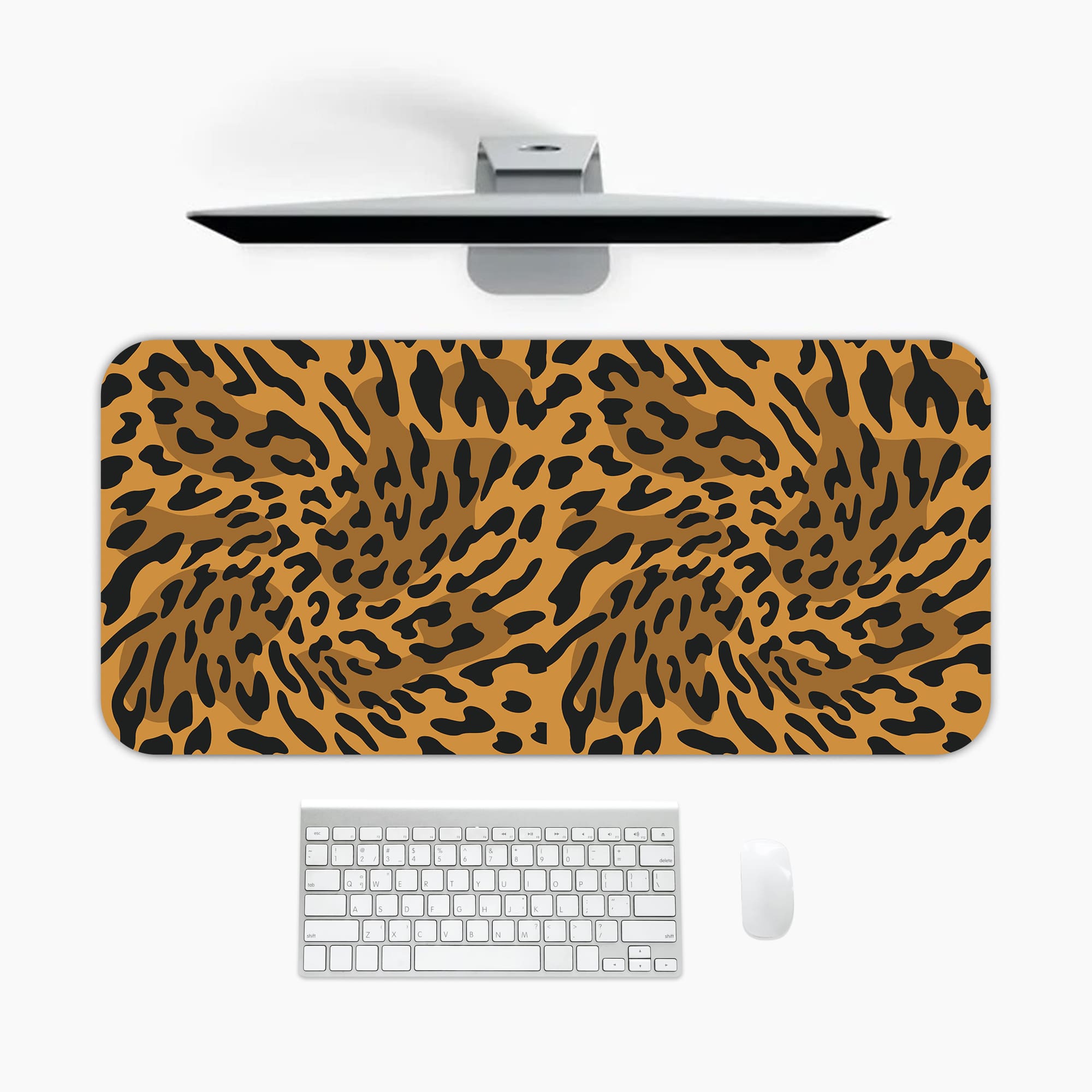 Infidu Leopard Print Desk Pad features a leopard print pattern with a brown background and black spots, resembling natural leopard fur. A desk pad under the computer