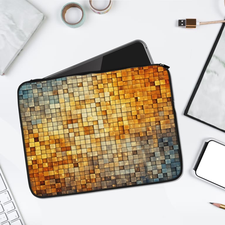 Mosaic pattern laptop sleeve with square tiles in gold, yellow, beige, and grey, featuring a gradient background for a modern, elegant design. laptop sleeve kept on a plain white background