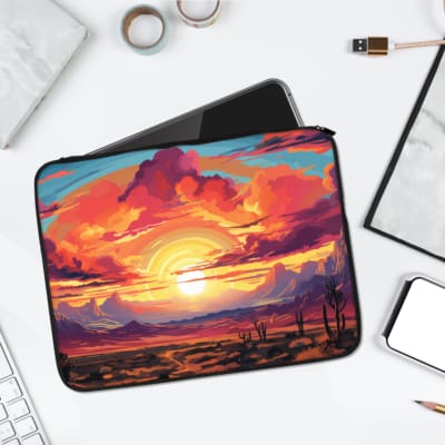Infidu Sunset Desert Landscape Laptop Sleeve featuring a vibrant sunset with orange, pink, and purple hues, set against a desert terrain. laptop sleeve kept on a plain white background