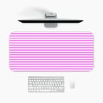 Pink and white striped desk pad with horizontal lines on a white background. A desk pad under the computer