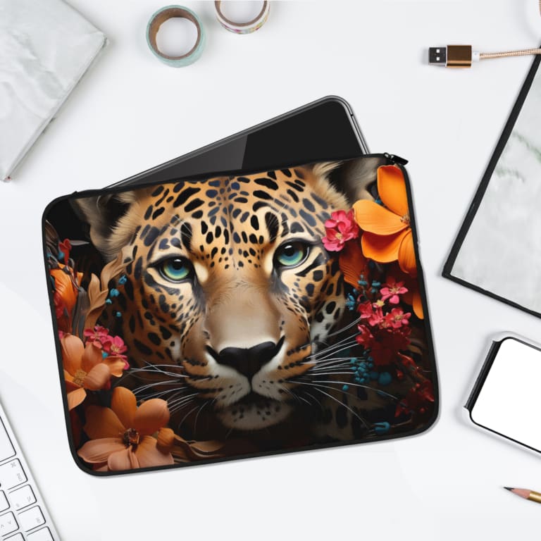 Infidu Leopard & Floral Laptop Sleeve with leopard and vibrant pink, orange, and yellow flowers. laptop sleeve kept on a plain white background