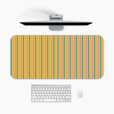 Infidu desk pad with vertical stripes in yellow, green, and light purple. A desk pad under the computer
