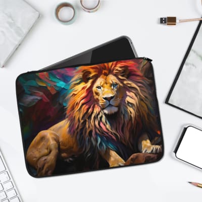 Realistic lion design with vibrant mane in orange, yellow, red, and blue on a laptop sleeve. laptop sleeve kept on a plain white background
