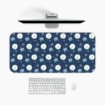 Infidu Dark Blue Desk Pad with white circles, light blue stripes, and snowflake pattern. A desk pad under the computer