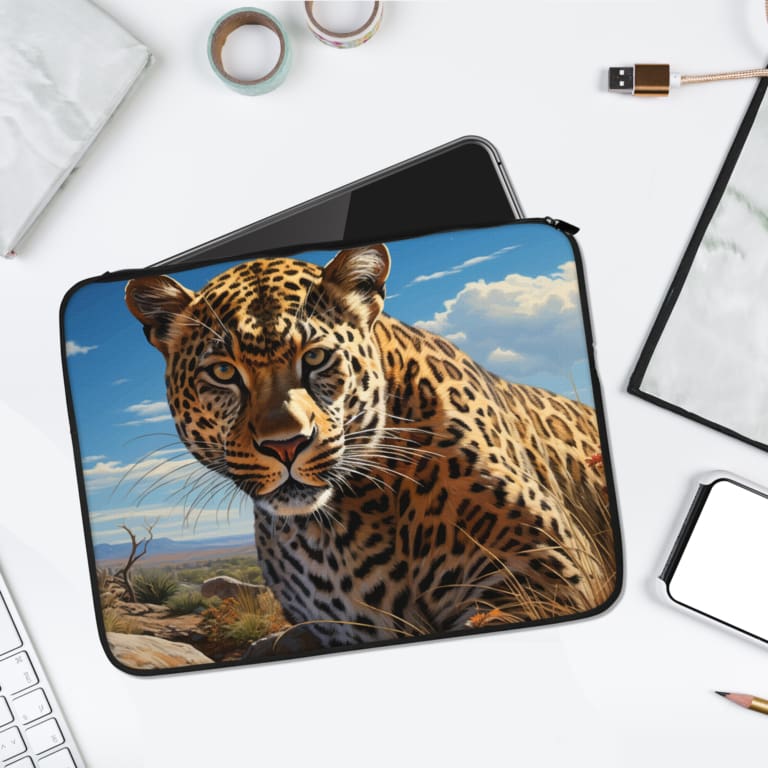 Infidu Striking Leopard Face Laptop Sleeve with detailed leopard face and vibrant sky background. laptop sleeve kept on a plain white background