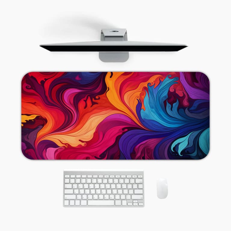 Infidu Colorful Swirling Pattern Desk Mat - Bright abstract design with swirling pinks, purples, reds, oranges, and blues. Desk Pad kept on a plain white background
