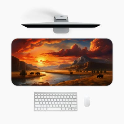 Infidu Sunset River Valley Desk Mat with warm sunset colors and a river flowing through mountains. A desk pad under the computer