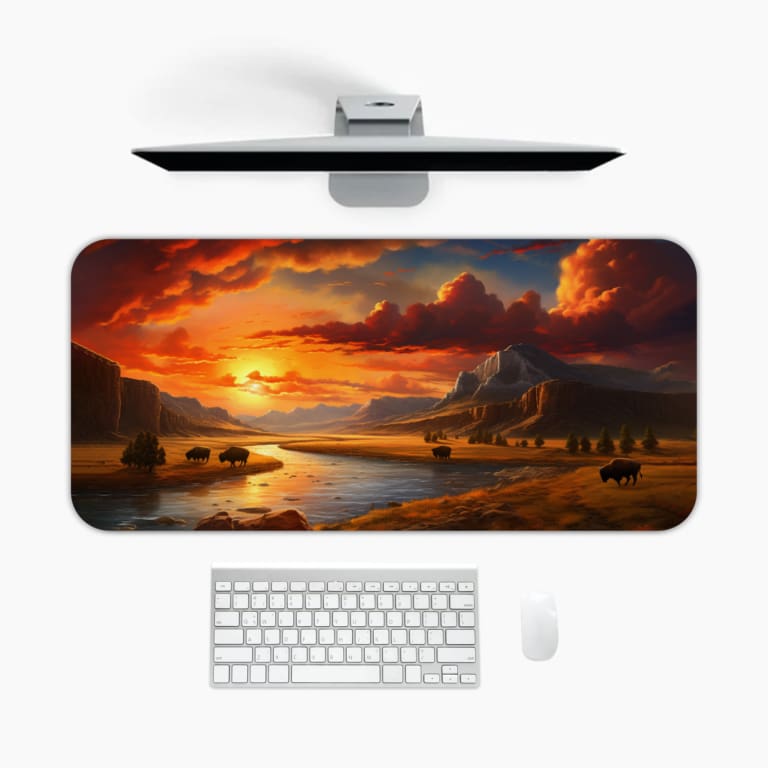 Infidu Sunset River Valley Desk Mat with warm sunset colors and a river flowing through mountains. A desk pad under the computer