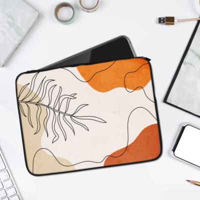 Infidu minimalist abstract laptop sleeve with botanical designs in orange, beige, white, and black line art. laptop sleeve kept on a plain white background