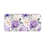 Infidu desk pad with colorful floral design on white background. Features large yellow and purple flowers with green and grayish leaves. Desk Pad kept on a plain white background