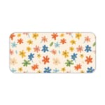 Infidu Colorful Floral Design Desk Pad with vibrant flowers in yellow, pink, blue, orange, and green on a light pink background. Desk Pad kept on a plain white background