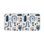 Blue tribal symbols desk pad with abstract patterns on a dim white background. Desk Pad kept on a plain white background