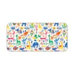 Bright desk mat featuring colorful animals, plants, and abstract shapes on a white background. Desk Pad kept on a plain white background
