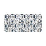 Blue abstract patterns including geometric shapes and faces on a white desk pad. Desk Pad kept on a plain white background