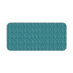 Desk pad with a green background and white ripple design, resembling water-like waves. Desk Pad kept on a plain white background