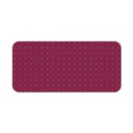 Pink desk pad with a pattern of small dots. Desk Pad kept on a plain white background