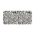 Infidu Bold Black and White Abstract Print Desk Pad with black abstract shapes on a white background, resembling animal print. Desk Pad kept on a plain white background