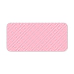 Light pink diagonal striped desk pad with a soft and pastel design, featuring thin pink stripes on a light background. Desk Pad kept on a plain white background