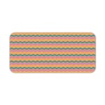 Desk pad with wavy lines in purple, green, and yellow on a light pink background. Desk Pad kept on a plain white background