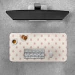 Light pink desk pad with small star design, perfect for adding charm to your workspace. Desk Pad with Keyboard and Mouse on top of the desk pad